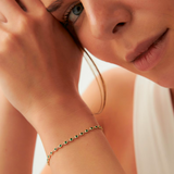 Bratara stil tennis din aur cu smarald de 0.85 ct