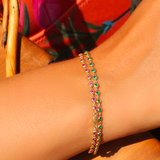 Bratara stil tennis din aur cu smarald de 0.85 ct