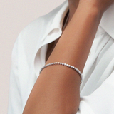 Bratara tennis din aur cu diamante de 2.00 ct. cu montura rotunda