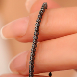 Bratara tennis din aur cu diamante negre de 1.05 ct