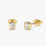 Cercei din aur cu diamante solitaire Emerald cut de 0.24 ct.