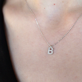 Lant cu pandantiv din aur cu literă si diamante de 0.7 ct.