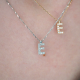 Lant cu pandantiv din aur cu literă si diamante de 0.7 ct.