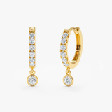 Cercei din aur rotunzi cu diamante de 0.28 ct.