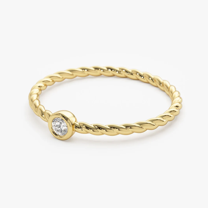 Inel din aur cu diamant rotund solitaire 0.10 ct model twisted band