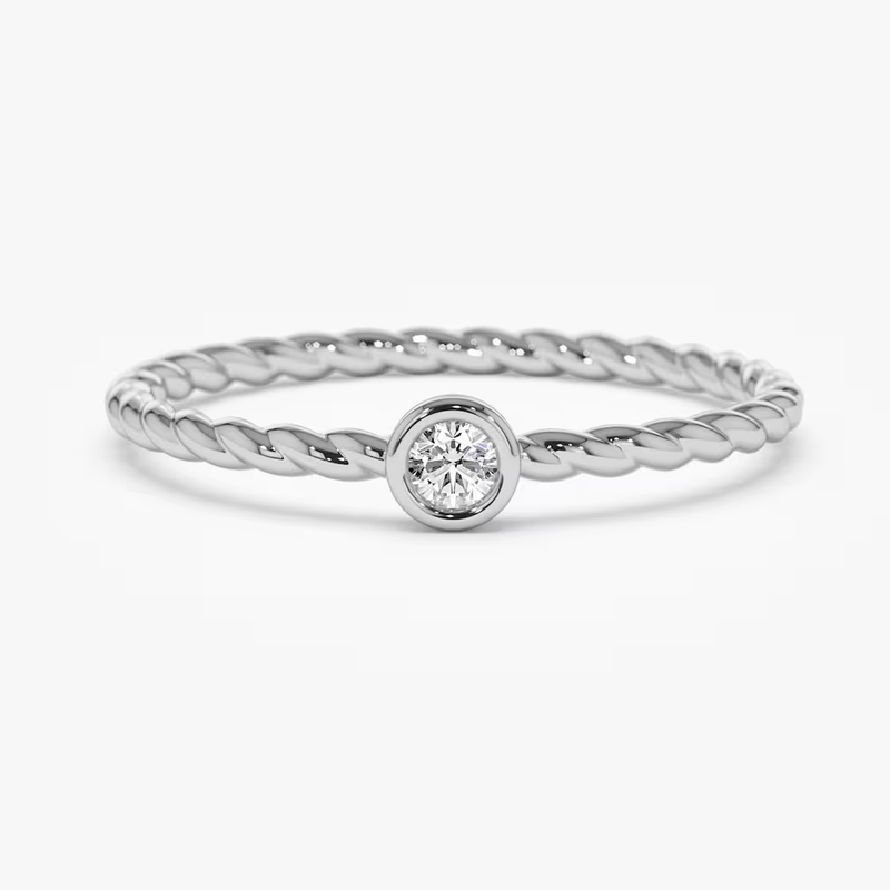 Inel din aur cu diamant rotund solitaire 0.10 ct model twisted band