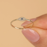 Inel din aur cu simbol Ochi de Deochi cu diamante si safir