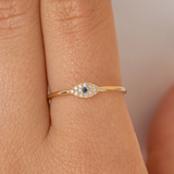 Inel din aur cu simbol Ochi de Deochi cu diamante si safir