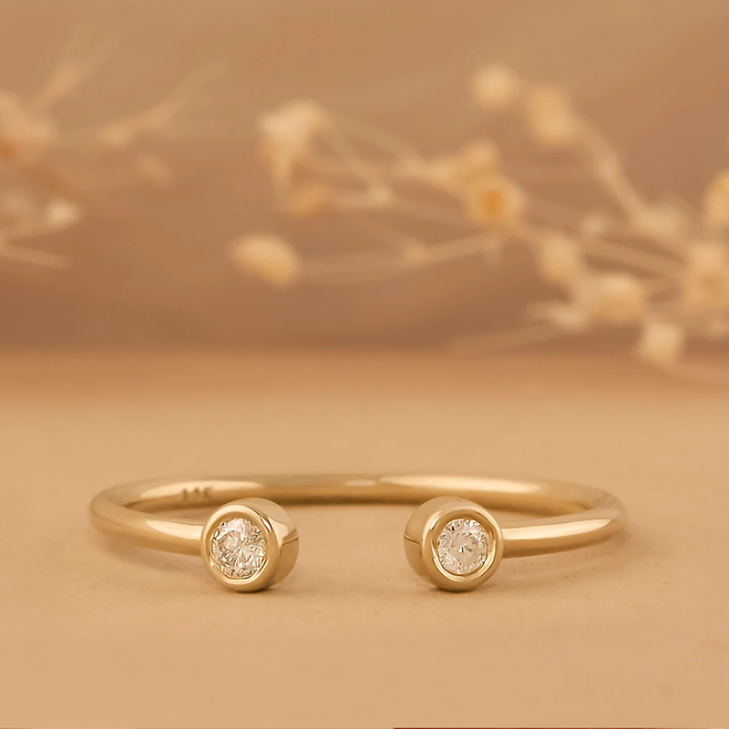 Inel din aur deschis cu doua diamante