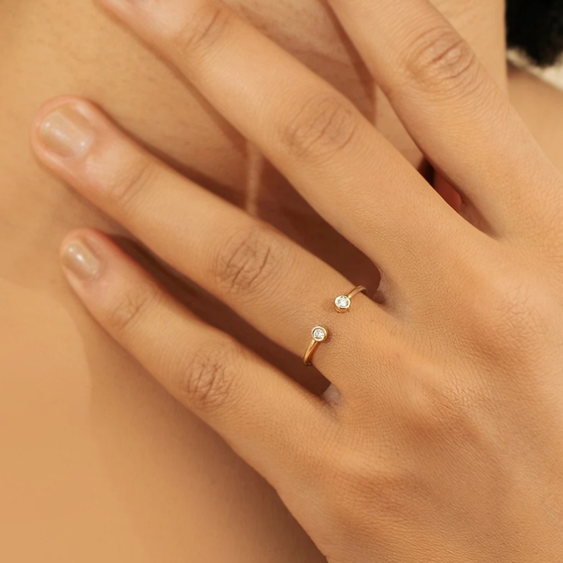 Inel din aur deschis cu doua diamante